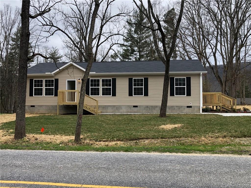 296 Souther Road Fletcher, NC 28732 - Photo 2 of 25 a front view of a house with a yard
