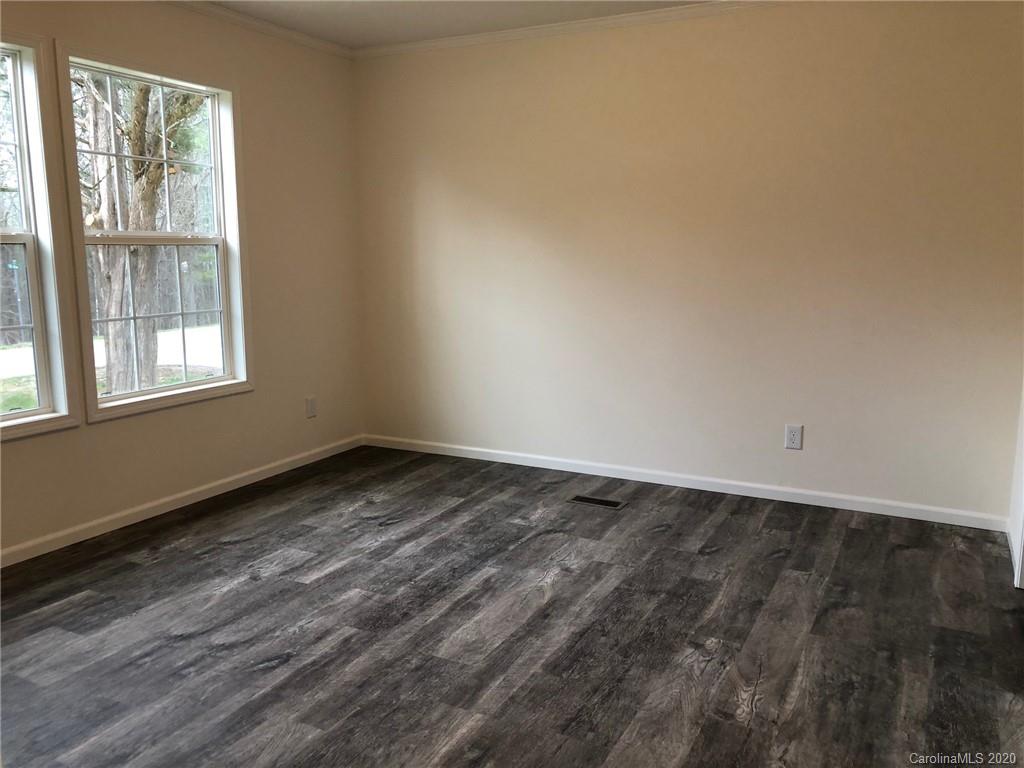 296 Souther Road Fletcher, NC 28732 - Photo 19 of 25 a view of an empty room and window