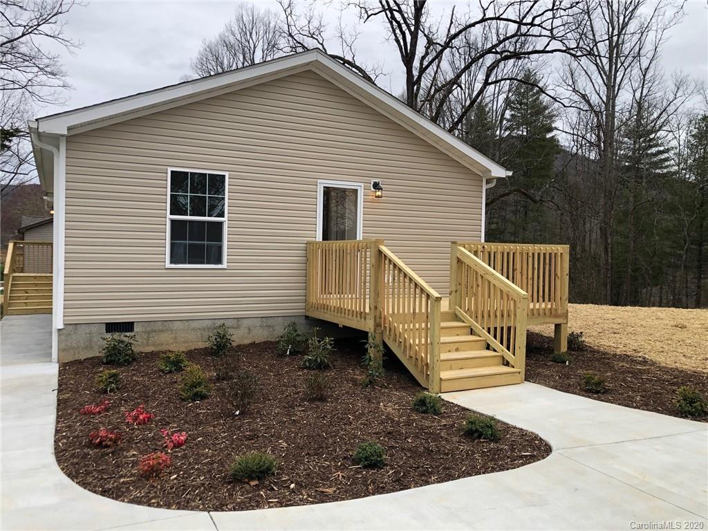 296 Souther Road Fletcher, NC 28732 - Photo 5 of 25 a view of a house with backyard