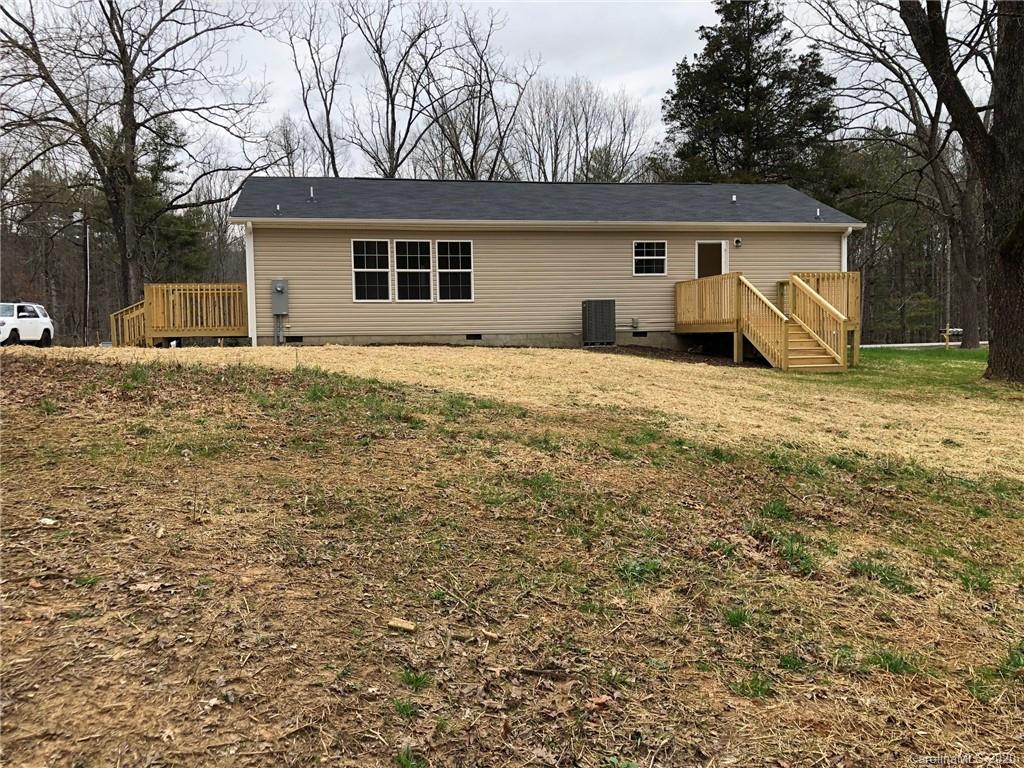 296 Souther Road Fletcher, NC 28732 - Photo 7 of 25 a view of a house with a yard