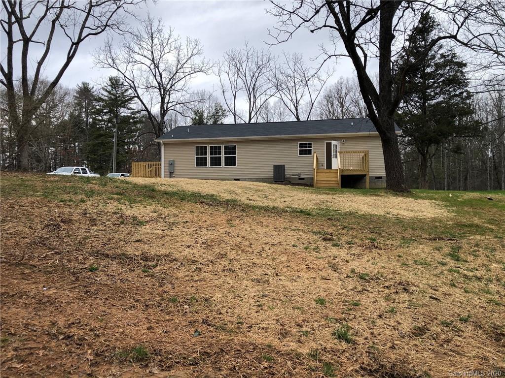 296 Souther Road Fletcher, NC 28732 - Photo 8 of 25 a house that has a tree in front of it