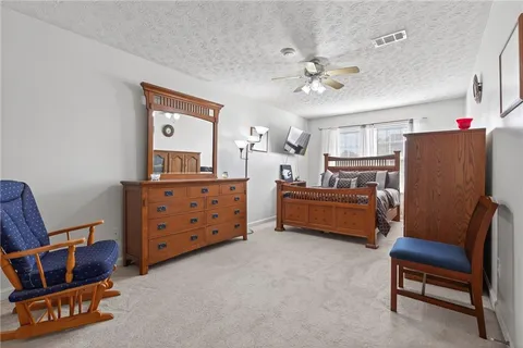 a view of balcony with wooden floor
