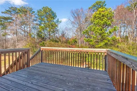 a view of a house next to a yard