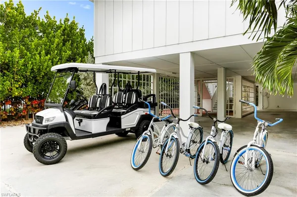 a couple of bicycles parked in front of house
