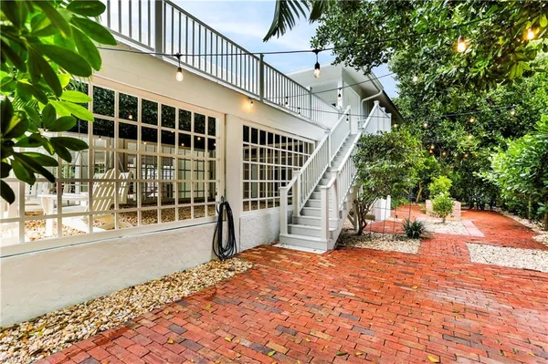 a garden view with a seating space