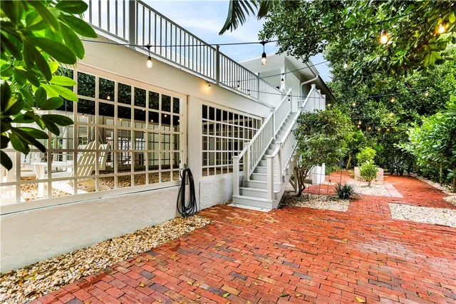 a garden view with a seating space