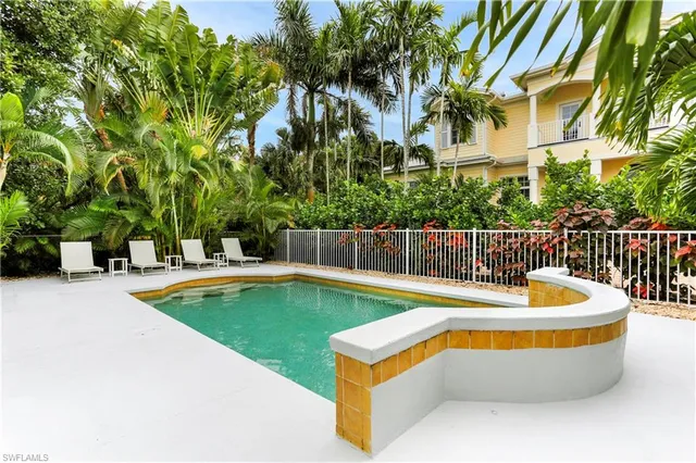 a bathroom with a sink and shower