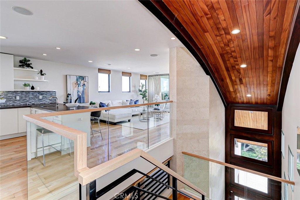 425 26th Street Manhattan Beach, CA 90266 - Photo 15 of 55 a kitchen with stainless steel appliances kitchen island granite countertop a stove and cabinets