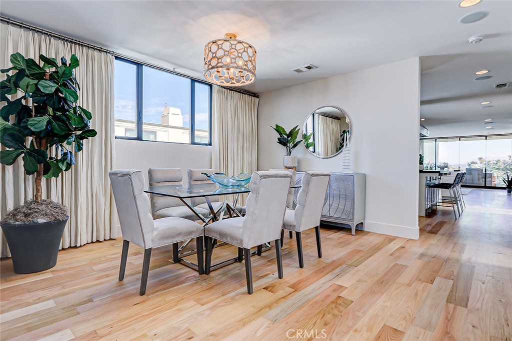 425 26th Street Manhattan Beach, CA 90266 - Photo 32 of 55 a view of a dining room with furniture and wooden floor