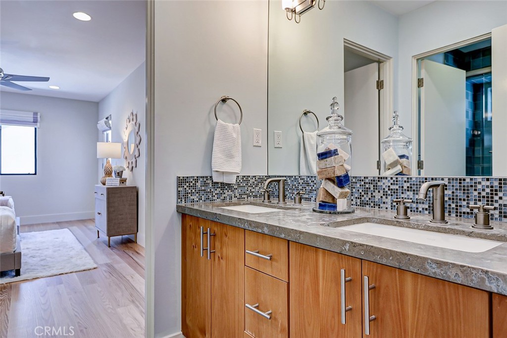 425 26th Street Manhattan Beach, CA 90266 - Photo 53 of 55 a bathroom with a sink double vanity and a mirror