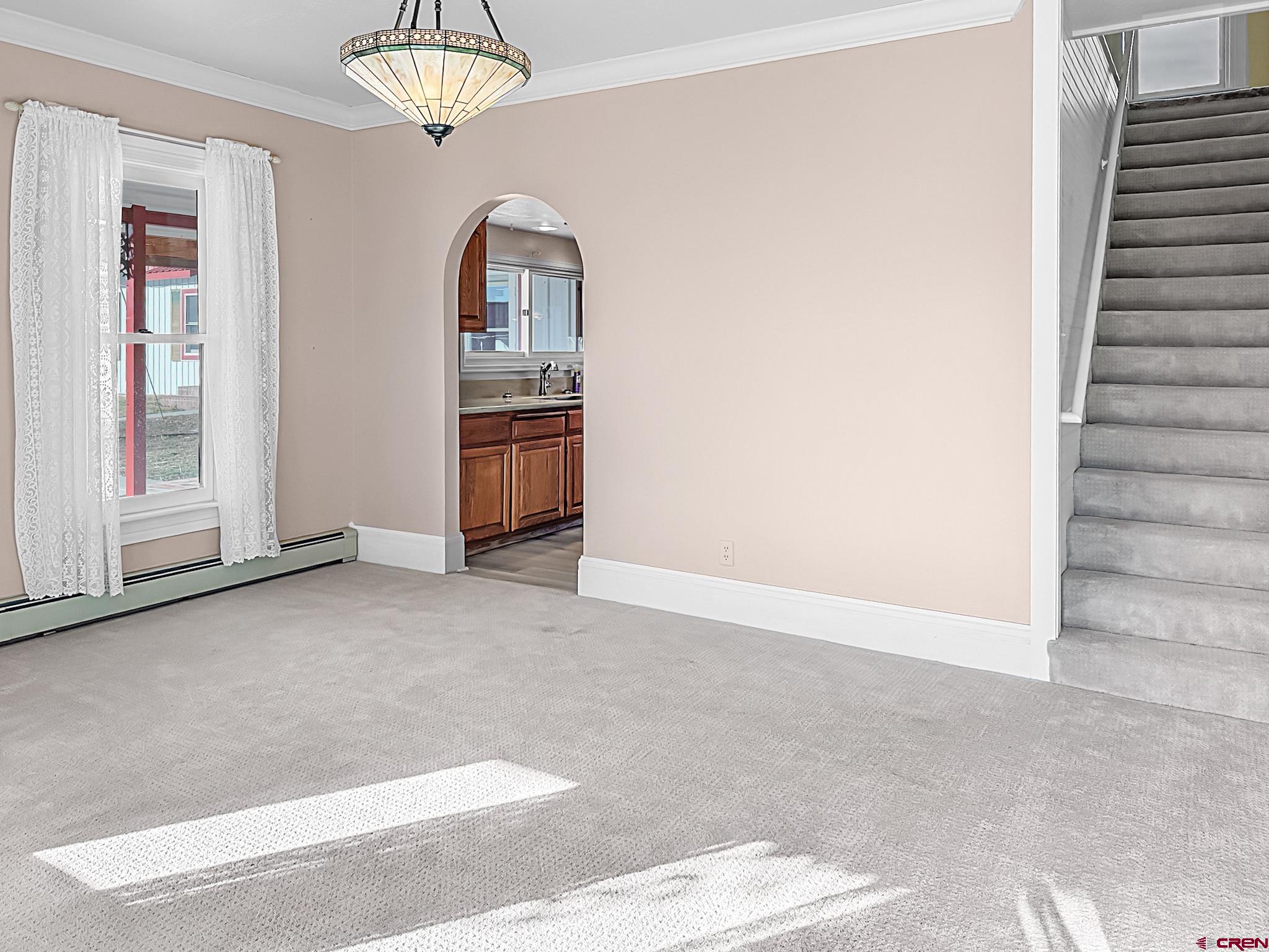 17343 Surface Creek Road Cedaredge, CO 81413 - Photo 2 of 45 a view of a bedroom with furniture and window