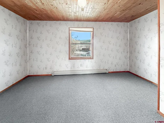 a house view with a backyard space