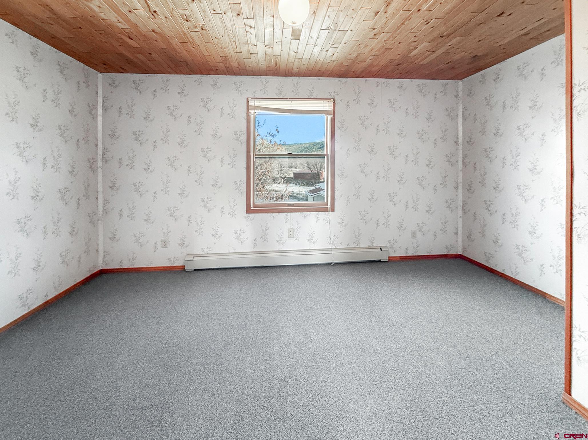 17343 Surface Creek Road Cedaredge, CO 81413 - Photo 21 of 45 a view of a big room with window