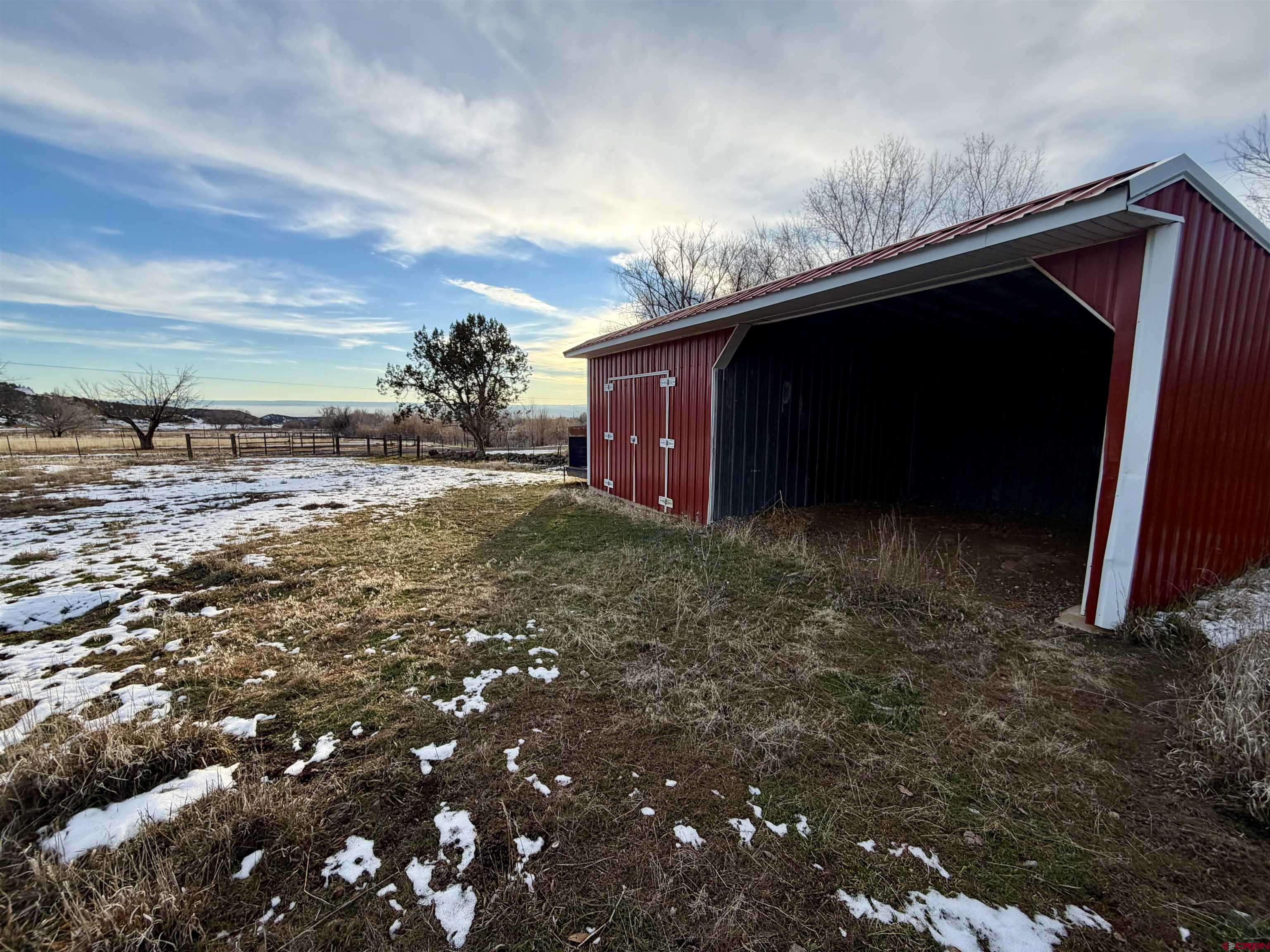 17343 Surface Creek Road Cedaredge, CO 81413 - Photo 25 of 45 a view of a backyard of the house