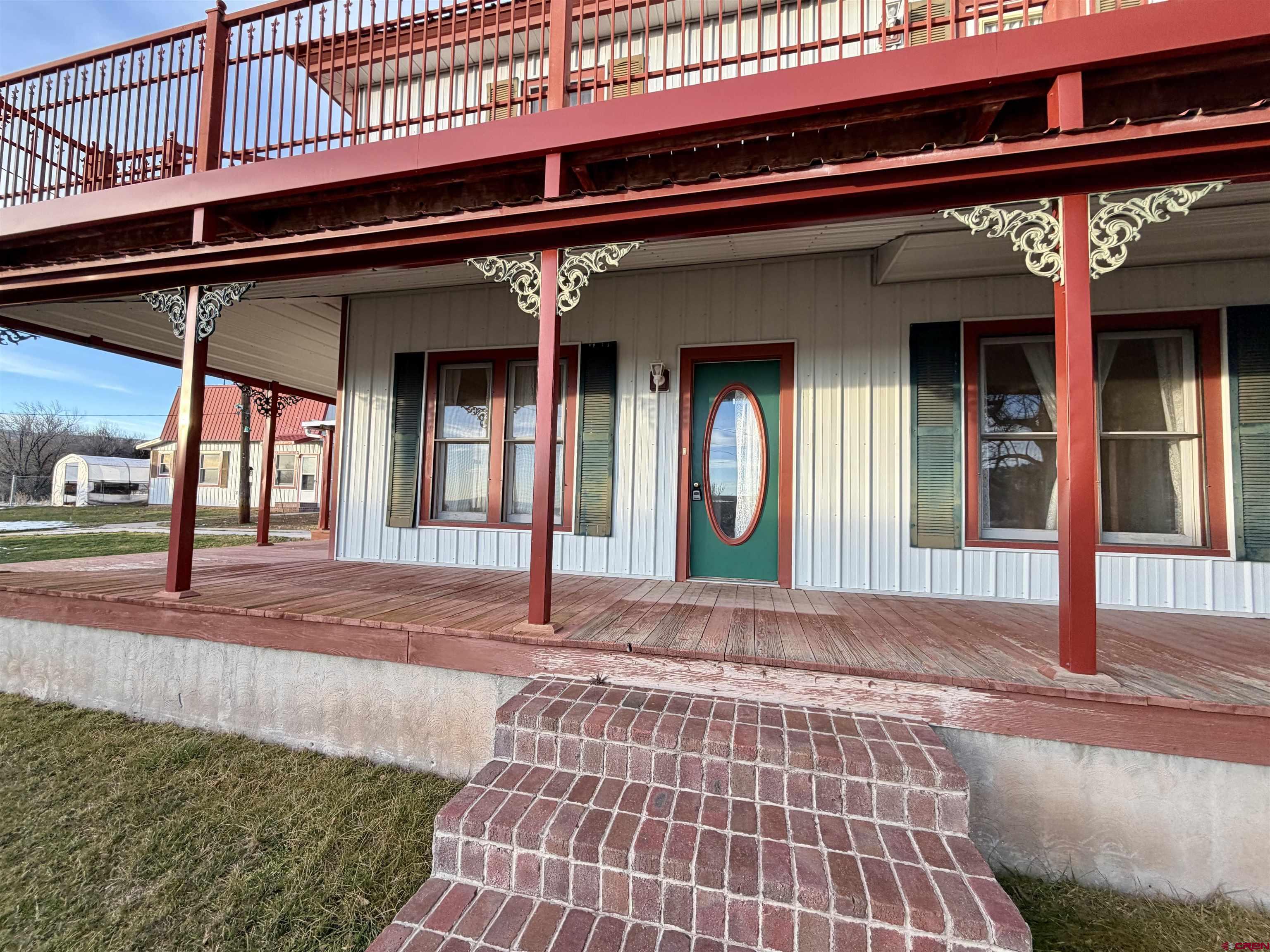 17343 Surface Creek Road Cedaredge, CO 81413 - Photo 28 of 45 front view of a building