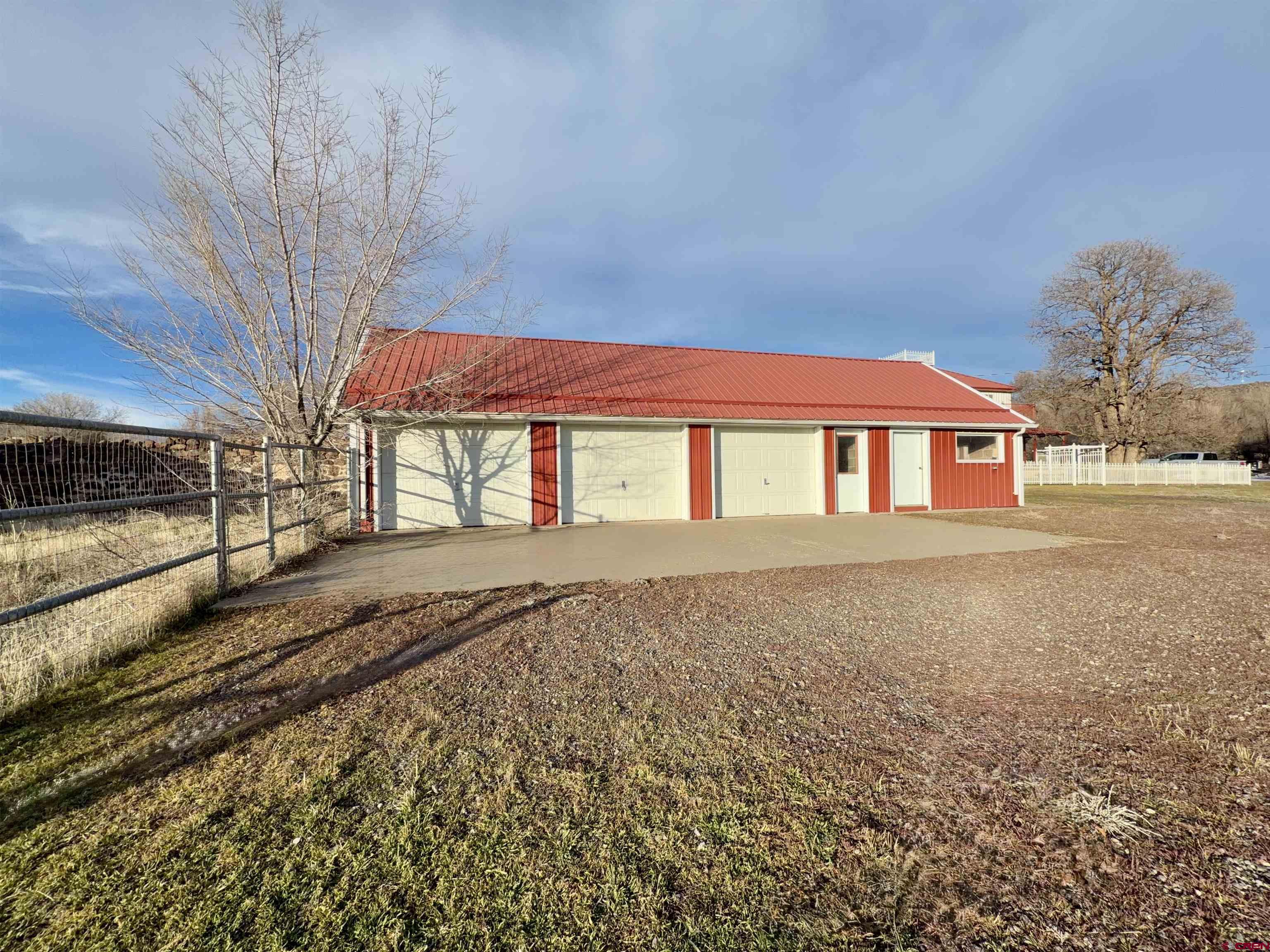 17343 Surface Creek Road Cedaredge, CO 81413 - Photo 45 of 45 a front view of a house with a yard