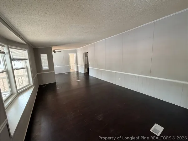an empty room with windows