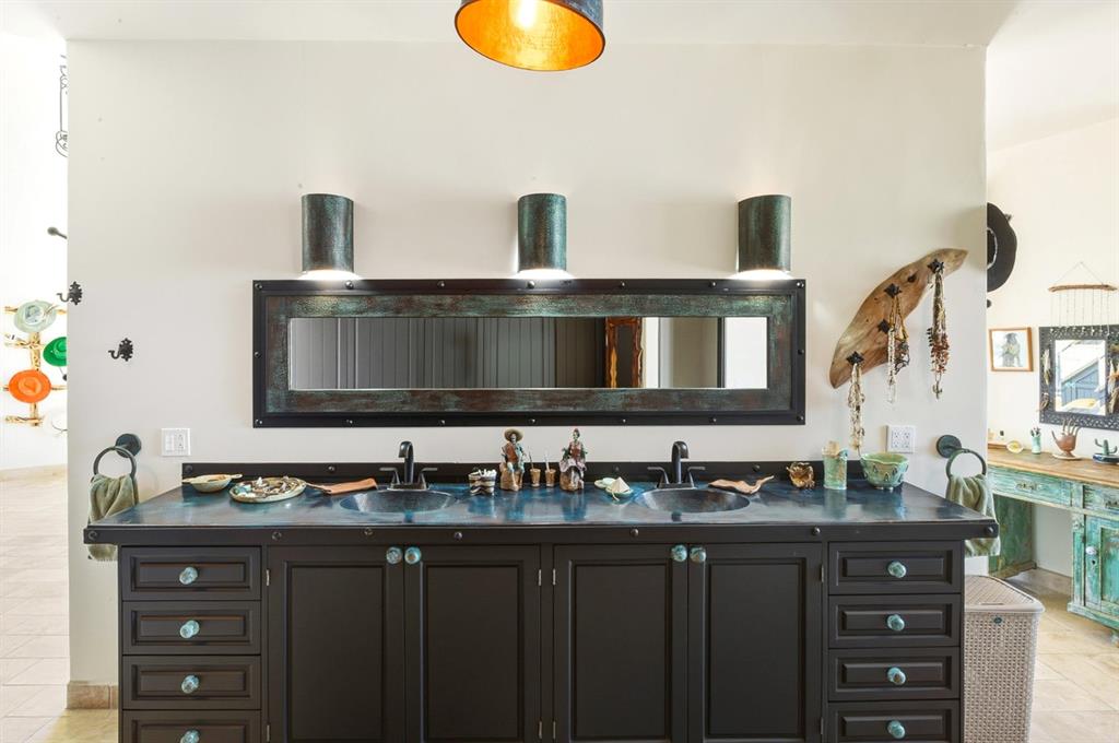 1 Arriba De Lane Roca, OUTSIDE OF THE US 99999 - Photo 13 of 40 a bathroom with double vanity and a mirror
