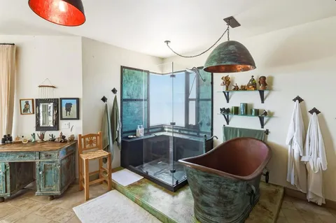 a view of a swimming pool with a lounge chair