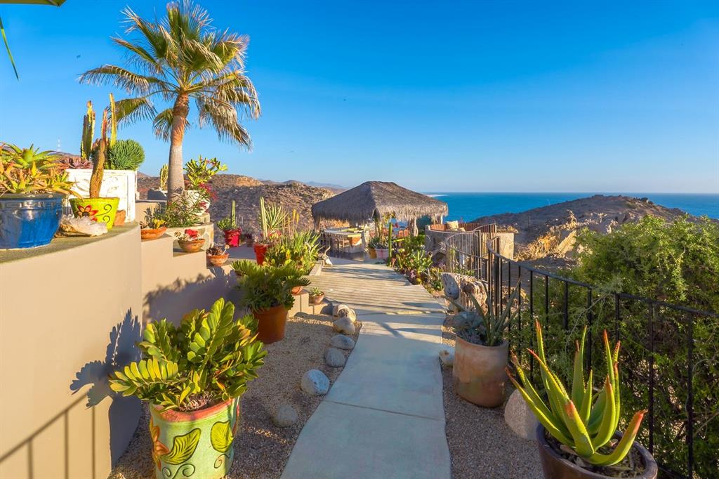 1 Arriba De Lane Roca, OUTSIDE OF THE US 99999 - Photo 25 of 40 a view of a city with flower plants