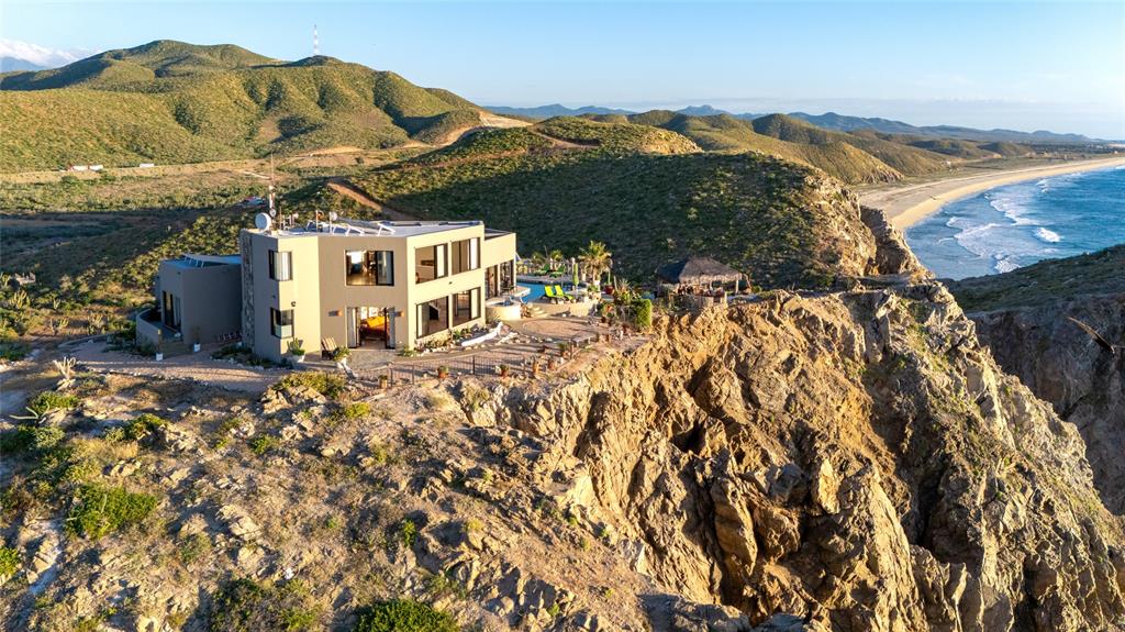1 Arriba De Lane Roca, OUTSIDE OF THE US 99999 - Photo 4 of 40 a view of a house with a backyard and a garden