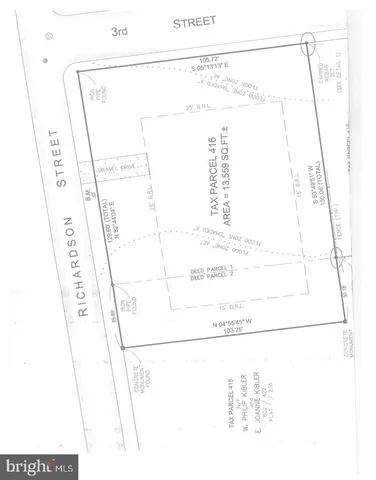 a view of a back yard of the house