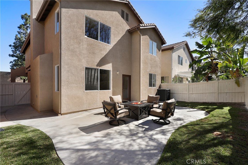 46 Nebraska Irvine, CA 92606 - Photo 24 of 36 a backyard of a house with table and chairs