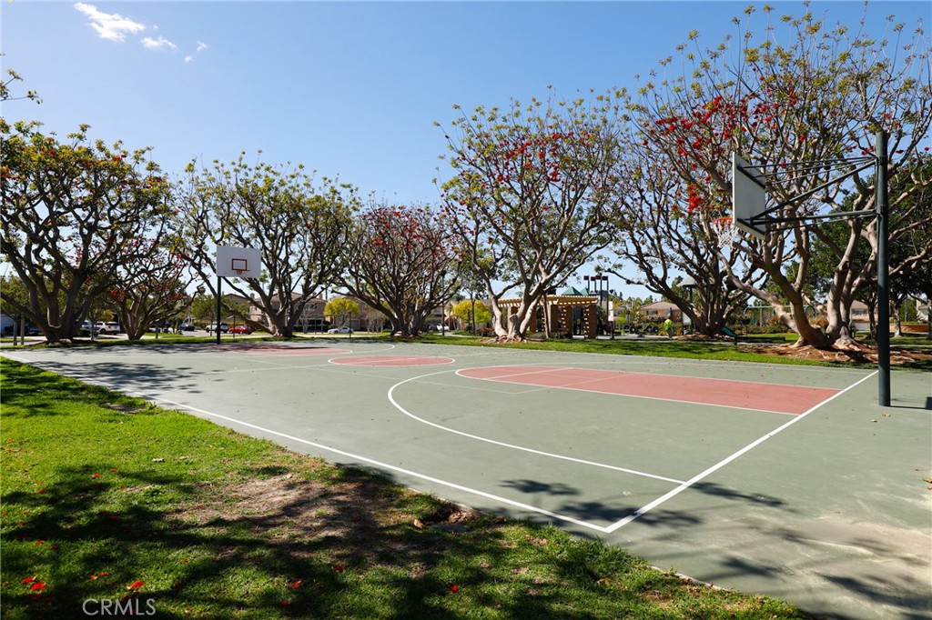 46 Nebraska Irvine, CA 92606 - Photo 26 of 36 a view of a tennis ground with large trees