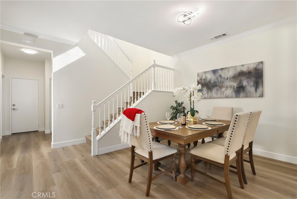 46 Nebraska Irvine, CA 92606 - Photo 6 of 36 a view of a dining room with furniture and wooden floor
