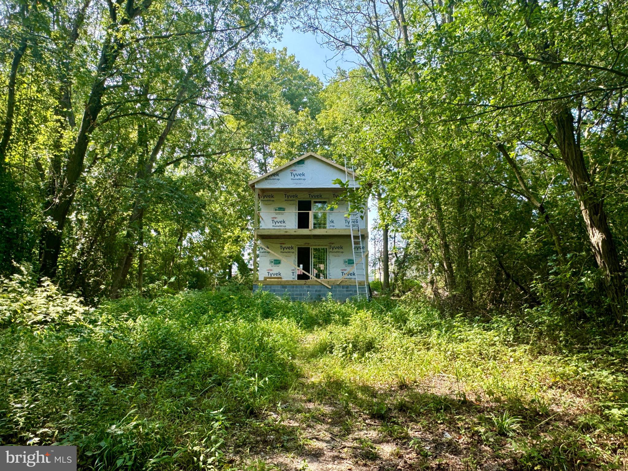 1115 West 6th Street Laurel, DE 19956 - Photo 34 of 34 a front view of a house with a yard