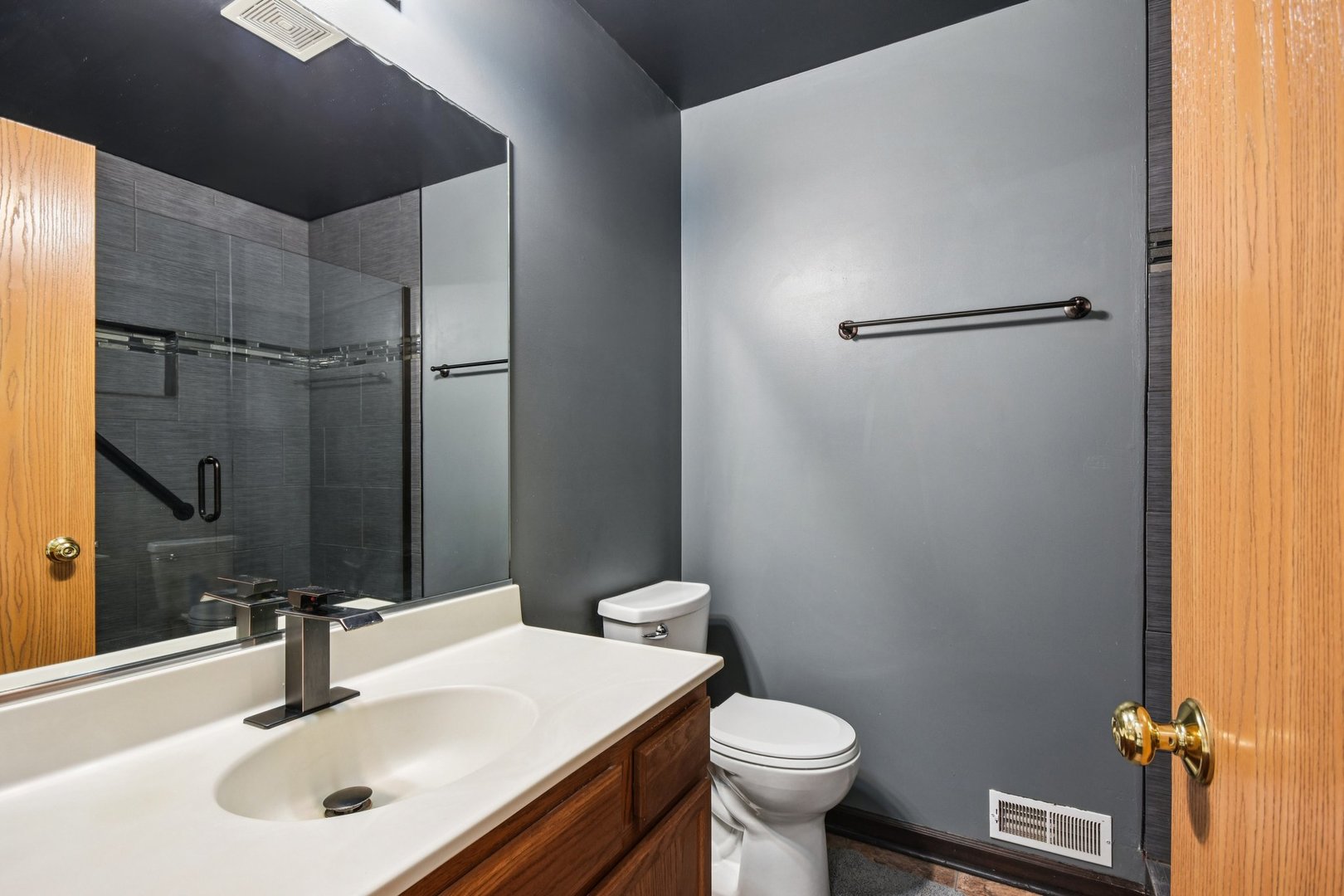 1524 Anderson Trail Zion, IL 60099 - Photo 15 of 22 a bathroom with a sink toilet and shower