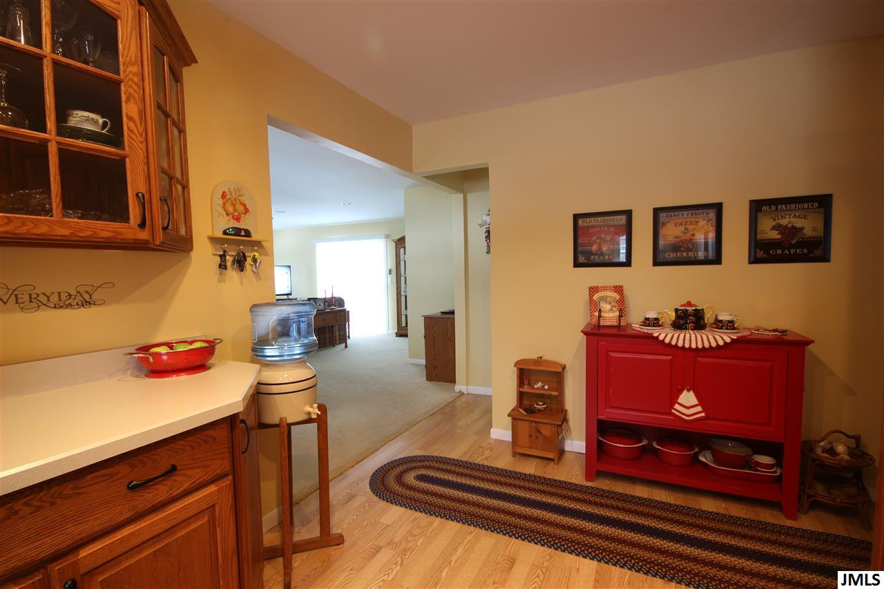 4409 Clinton Road Jackson, MI 49201 - Photo 8 of 24 Kitchen leads to the large family room.