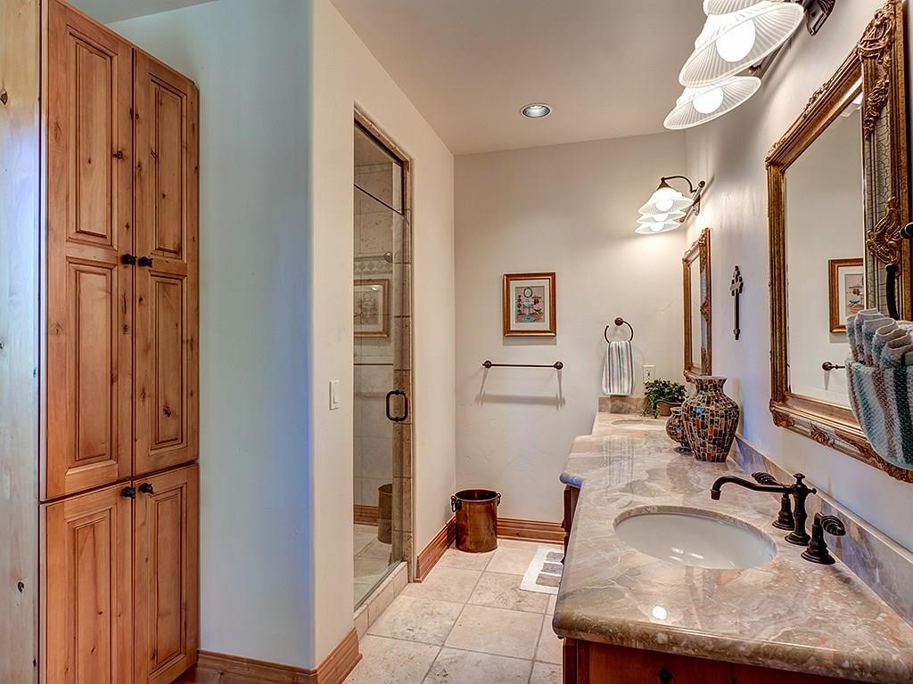 677 White Cloud Drive Breckenridge, CO 80424 - Photo 13 of 25 a bathroom with a granite countertop sink and a mirror
