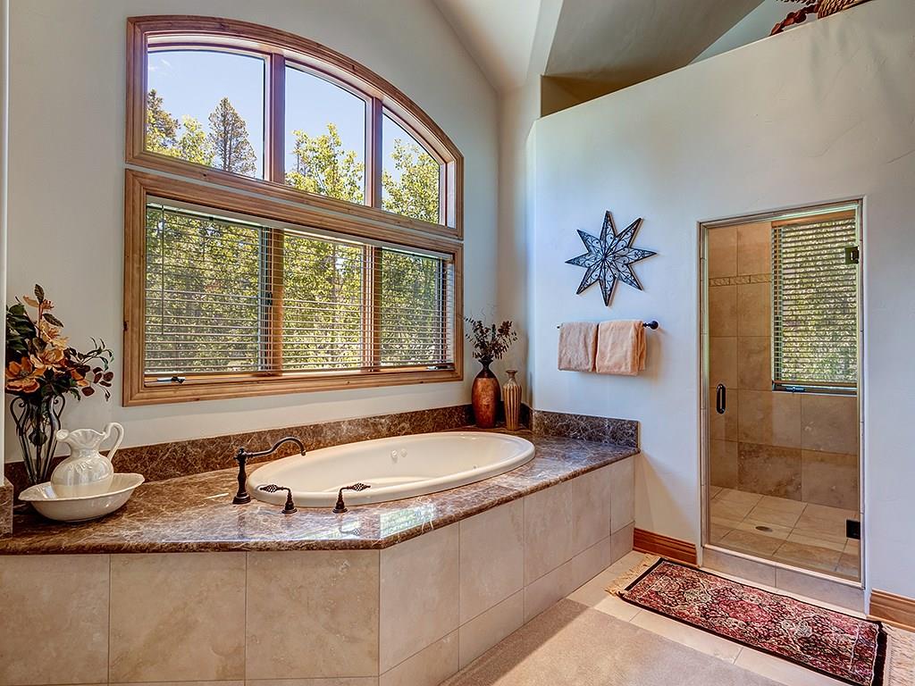 677 White Cloud Drive Breckenridge, CO 80424 - Photo 15 of 25 a bath tub sitting next to a bathroom