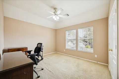 a bathroom with a sink vanity and a mirror