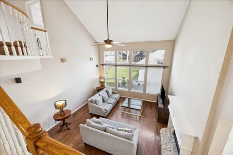 an aerial view of a house with a swimming pool