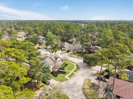 front view of a house with a garden