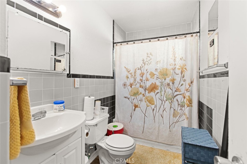 1012 Poppy Street Chico, CA 95928 - Photo 17 of 37 a bathroom with a sink toilet and shower