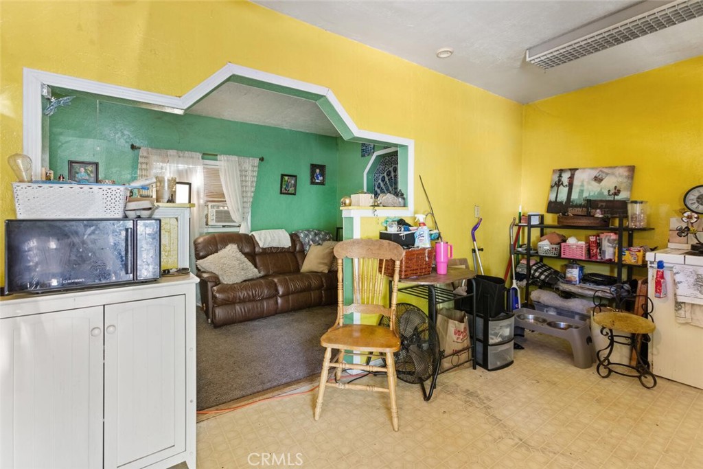 1012 Poppy Street Chico, CA 95928 - Photo 21 of 37 a living room with furniture and a flat screen tv