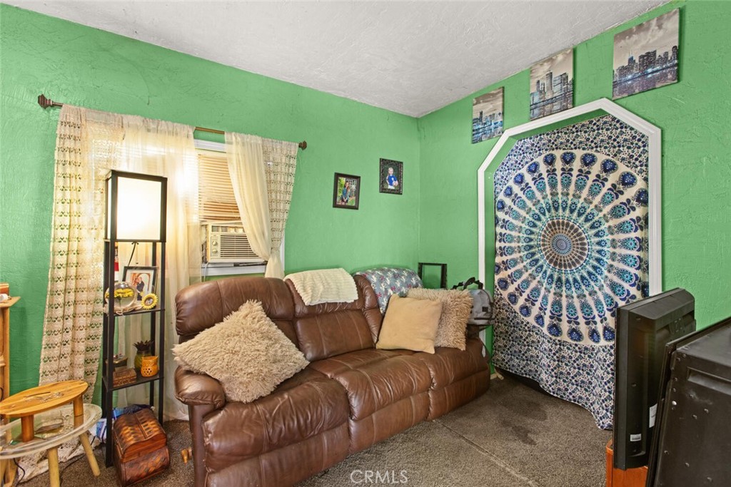 1012 Poppy Street Chico, CA 95928 - Photo 23 of 37 a living room with furniture and a window