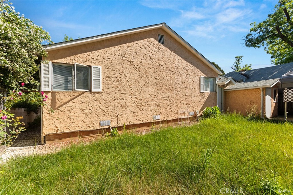 1012 Poppy Street Chico, CA 95928 - Photo 32 of 37 front view of a house with a yard