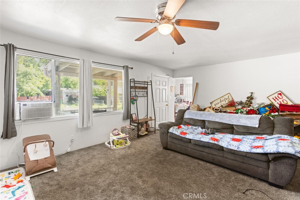 1012 Poppy Street Chico, CA 95928 - Photo 8 of 37 a bed room with furniture and a window