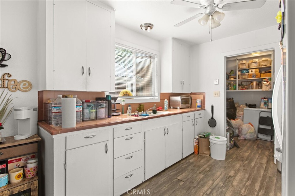 1012 Poppy Street Chico, CA 95928 - Photo 10 of 37 a kitchen with cabinets a sink and appliances
