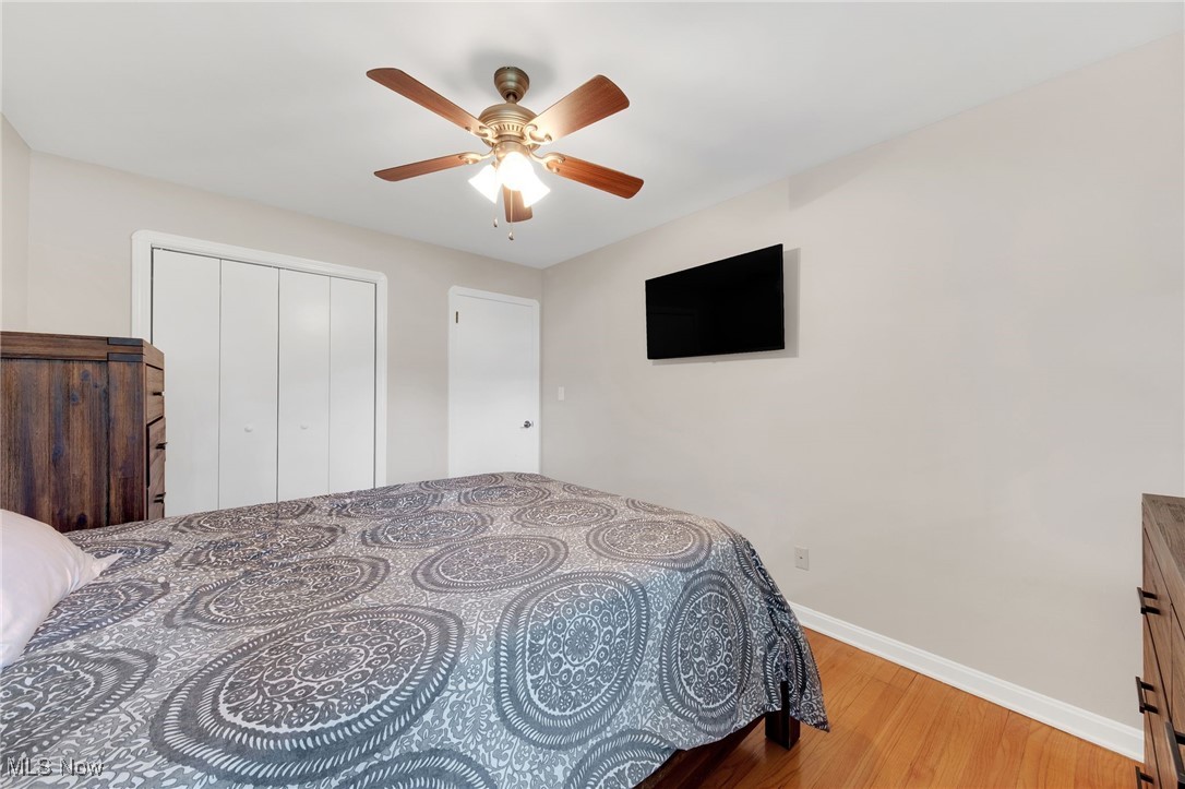 10620 Ridge Road North Royalton, OH 44133 - Photo 13 of 35 Bedroom with wood finished floors, ceiling fan, and a closet