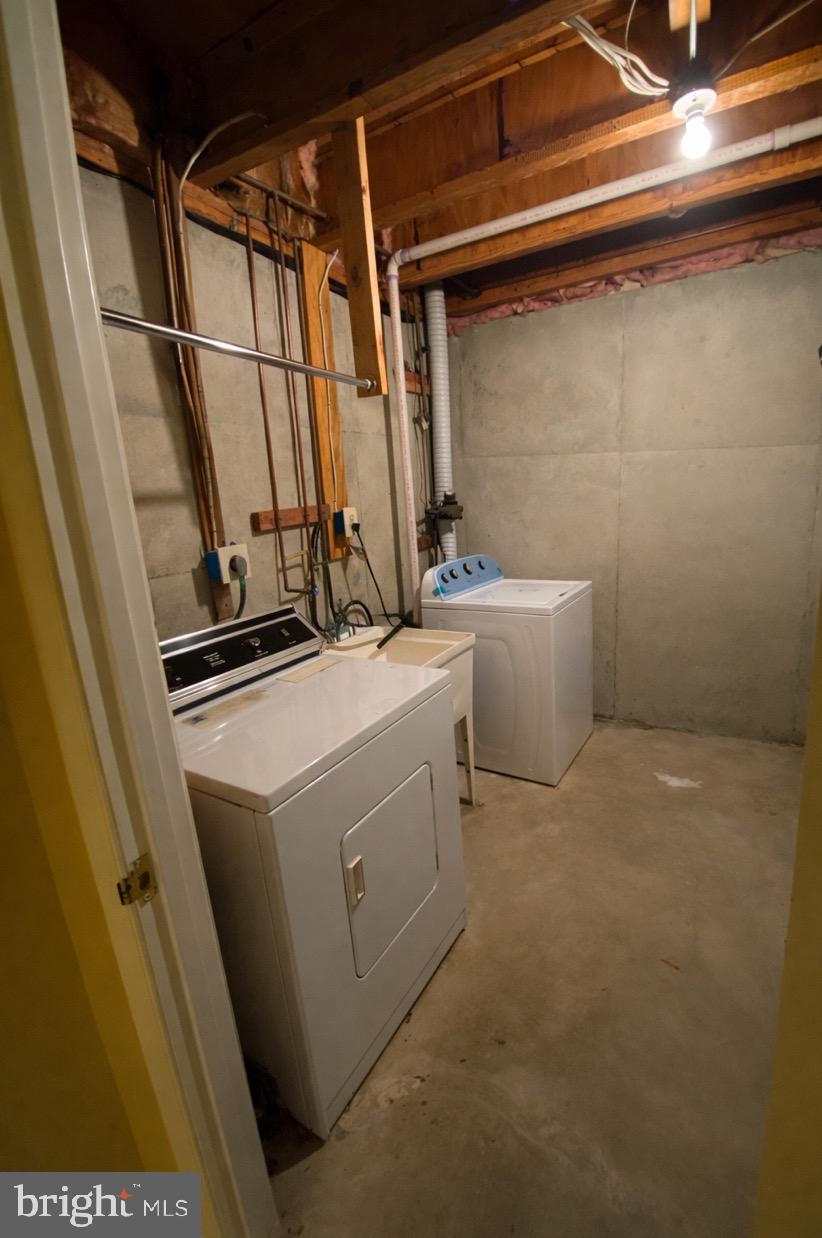 44 Long Green Court Silver Spring, MD 20906 - Photo 14 of 16 Functional laundry space with modern appliances.