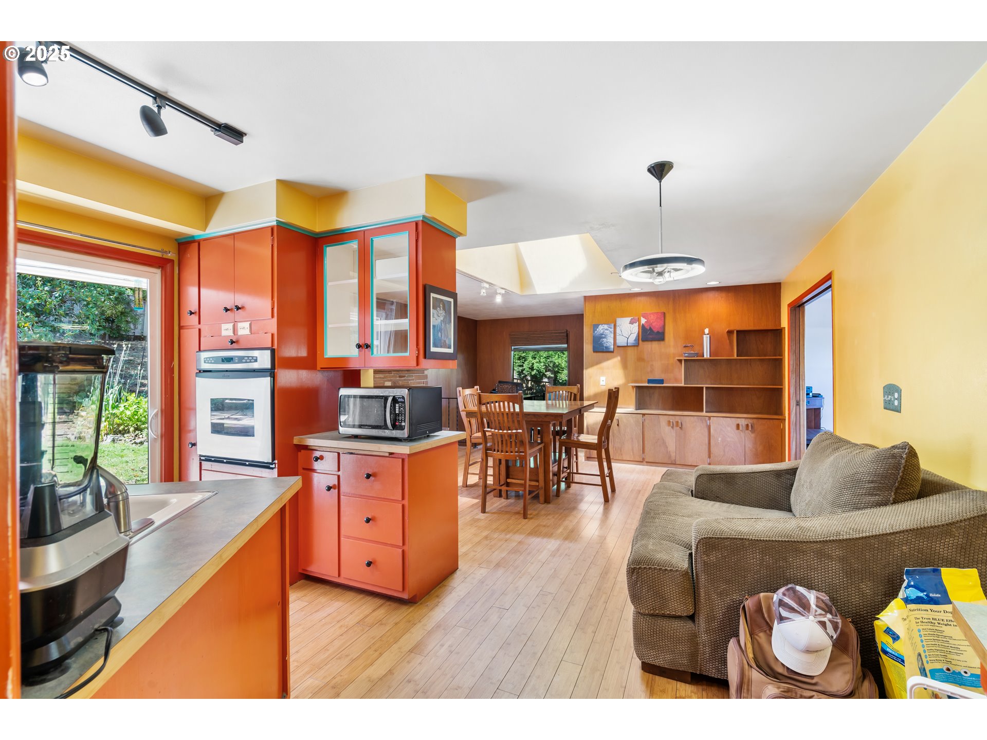 2120 West 23rd Avenue Eugene, OR 97405 - Photo 11 of 35 a living room with furniture and a large window