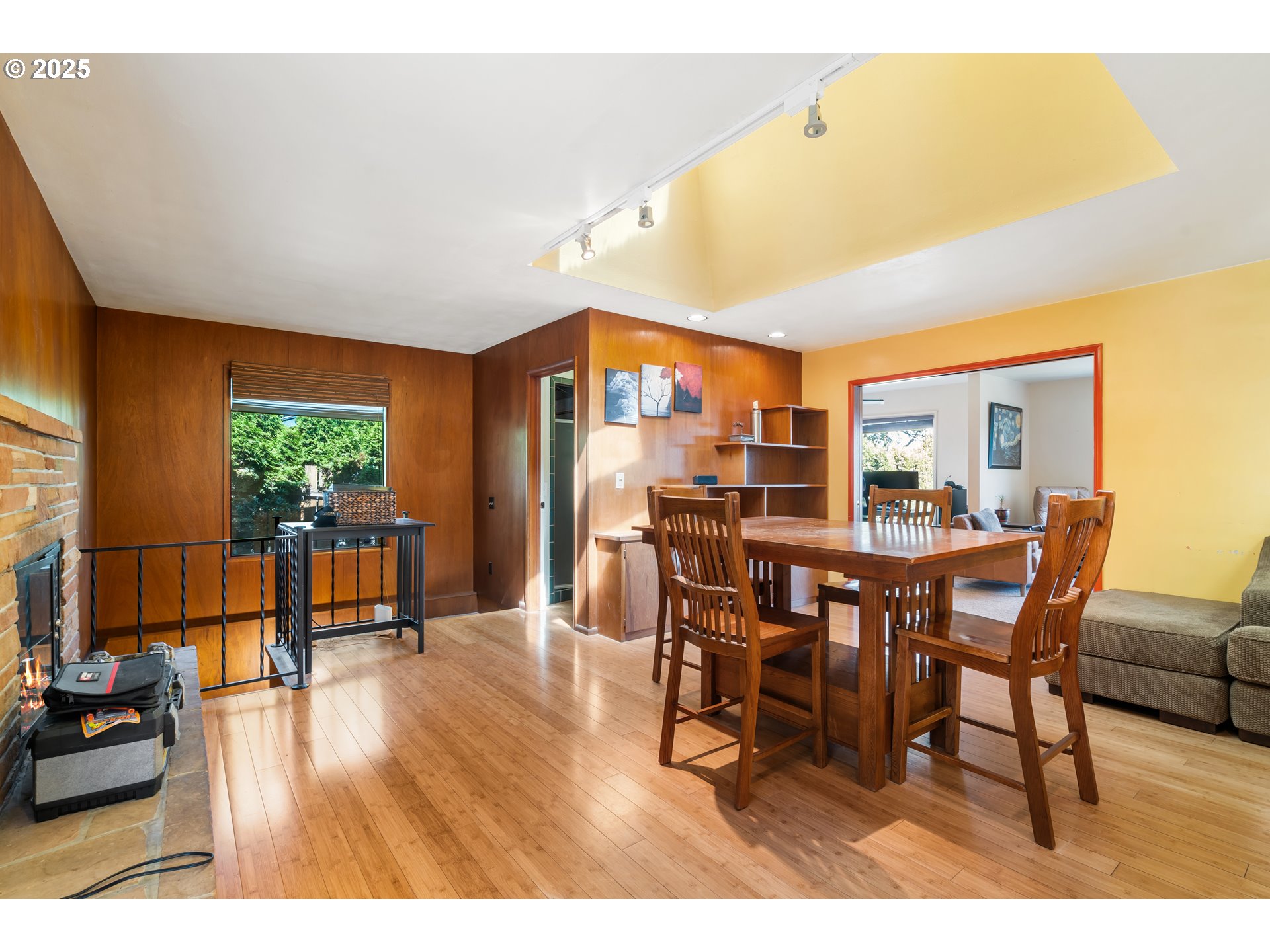 2120 West 23rd Avenue Eugene, OR 97405 - Photo 10 of 35 a view of a dining room with furniture and wooden floor