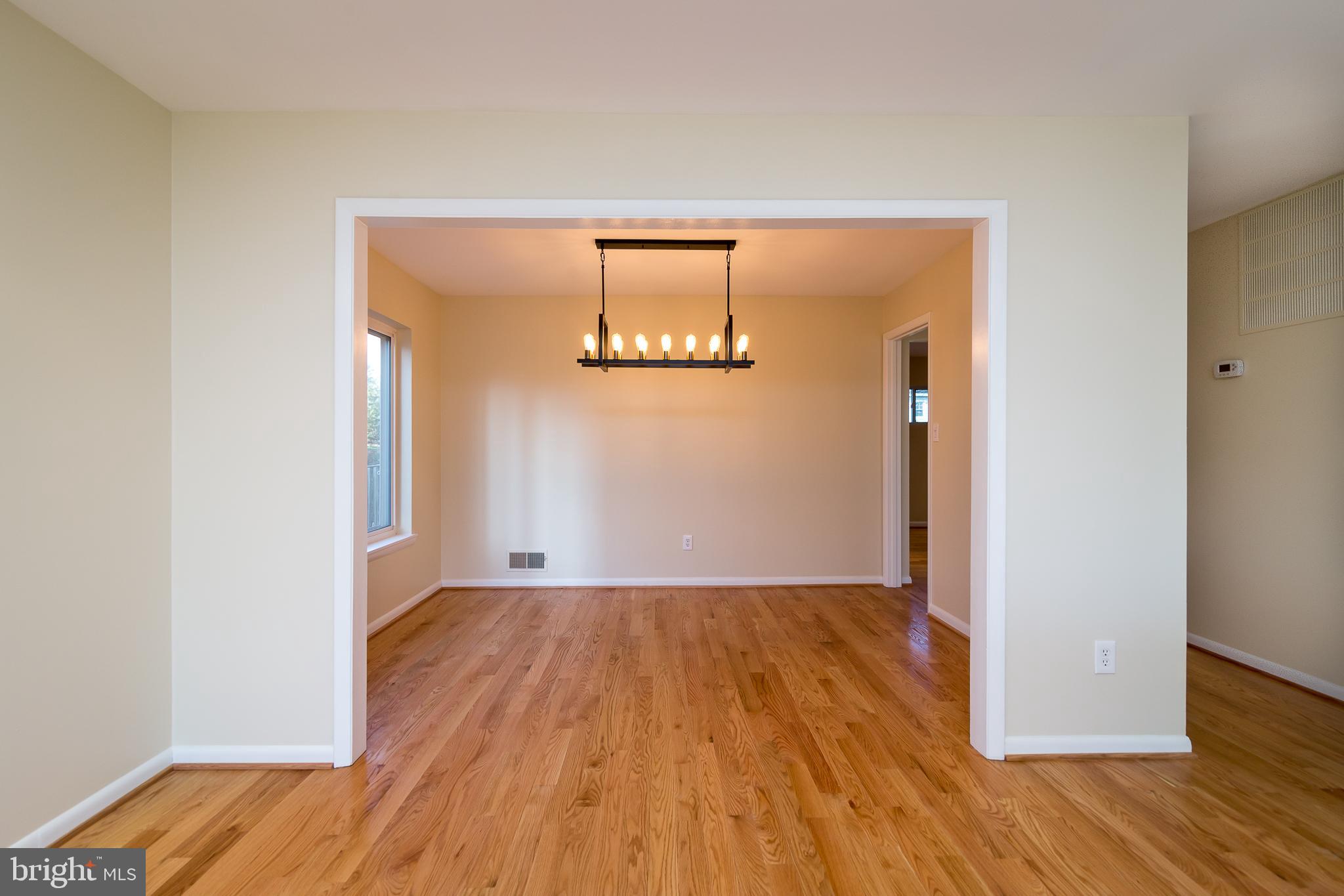 6862 St Albans Road McLean, VA 22101 - Photo 9 of 29 a view of a room with wooden floor