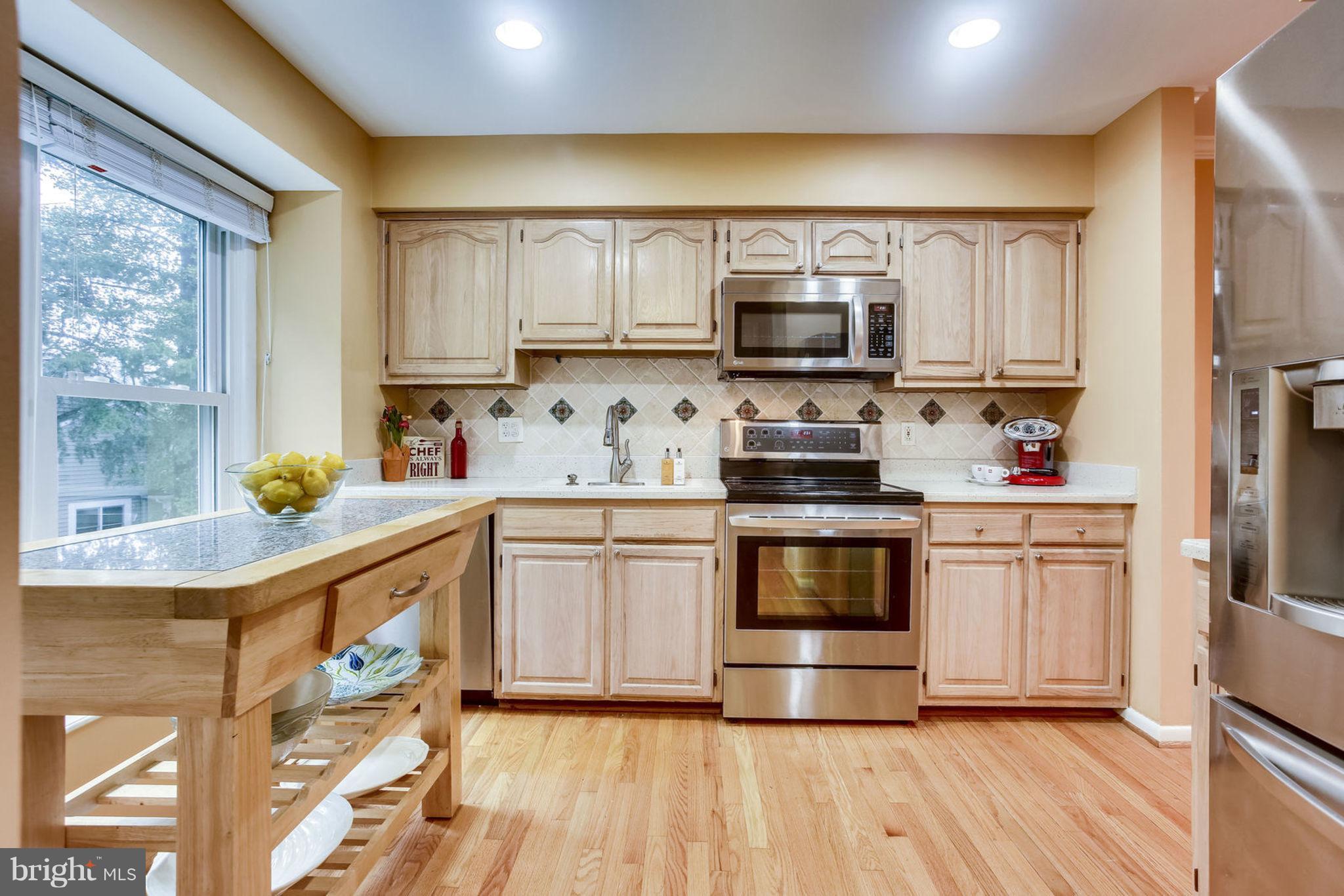 1447 Newport Spring Court Reston, VA 20194 - Photo 5 of 29 Gourmet kitchen with LG Stainless appliances