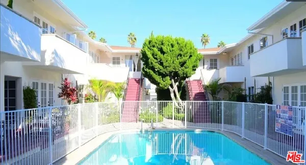 a front view of a house with a porch